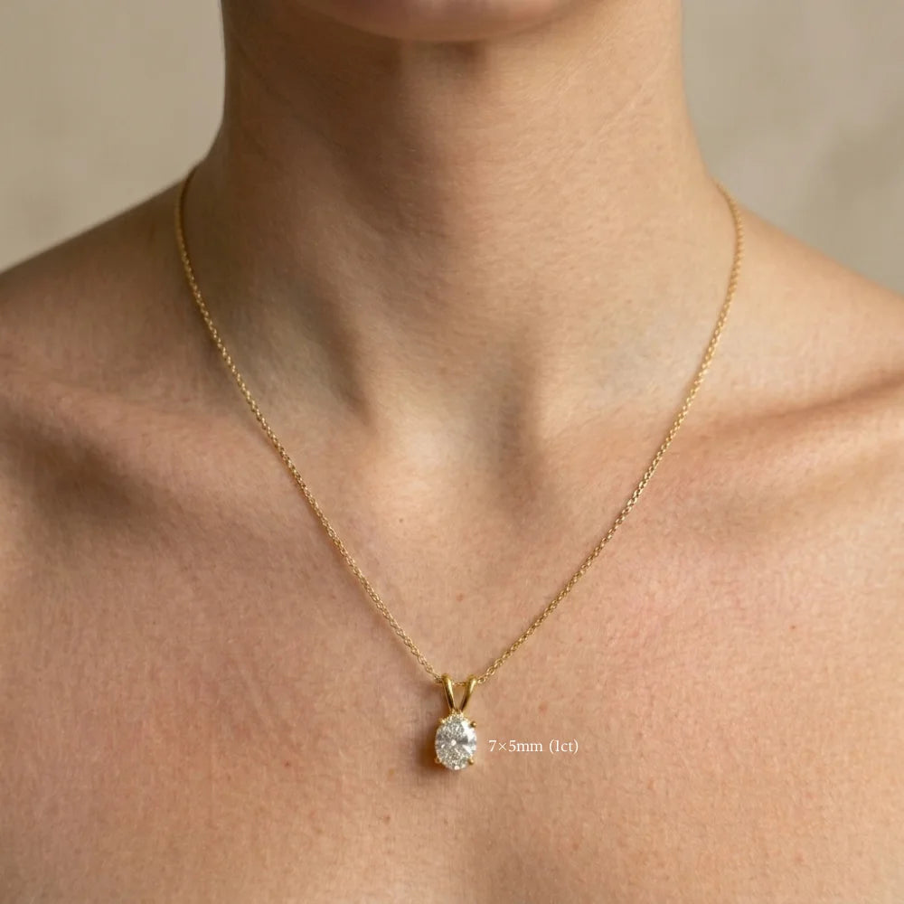 7x5mm 1ct oval moissanite pendant necklace in 14K gold filled worn at the collarbone - Sensitive Stones