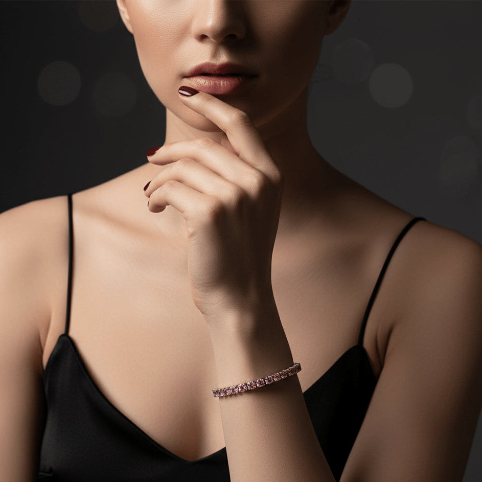 Pink moissanite tennis bracelet with 5mm stones in sterling silver, worn by woman in black satin dress, elegant evening jewelry – Sensitive Stones