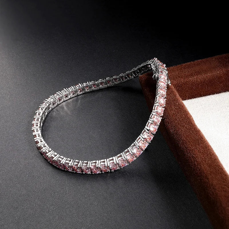 Pink Moissanite Tennis Bracelet in 925 Sterling Silver with 18K White Gold Plating on dark background | Sensitive Stones
