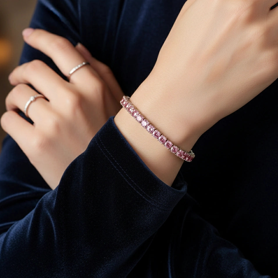 4mm Pink moissanite tennis bracelet with in sterling silver, worn by woman in navy blue velvet dress, elegant evening jewelry – Sensitive Stones