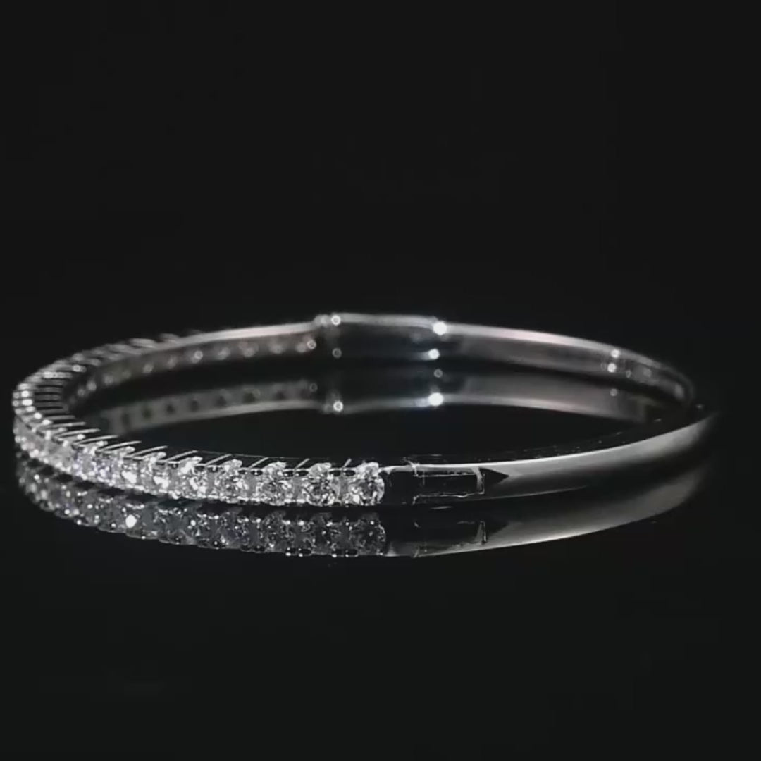 Video showing moissanite bangle bracelet brilliance, sparkling D color VVS1 stones in 925 sterling silver under studio light - Sensitive Stones