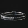 Video showing moissanite bangle bracelet brilliance, sparkling D color VVS1 stones in 925 sterling silver under studio light - Sensitive Stones
