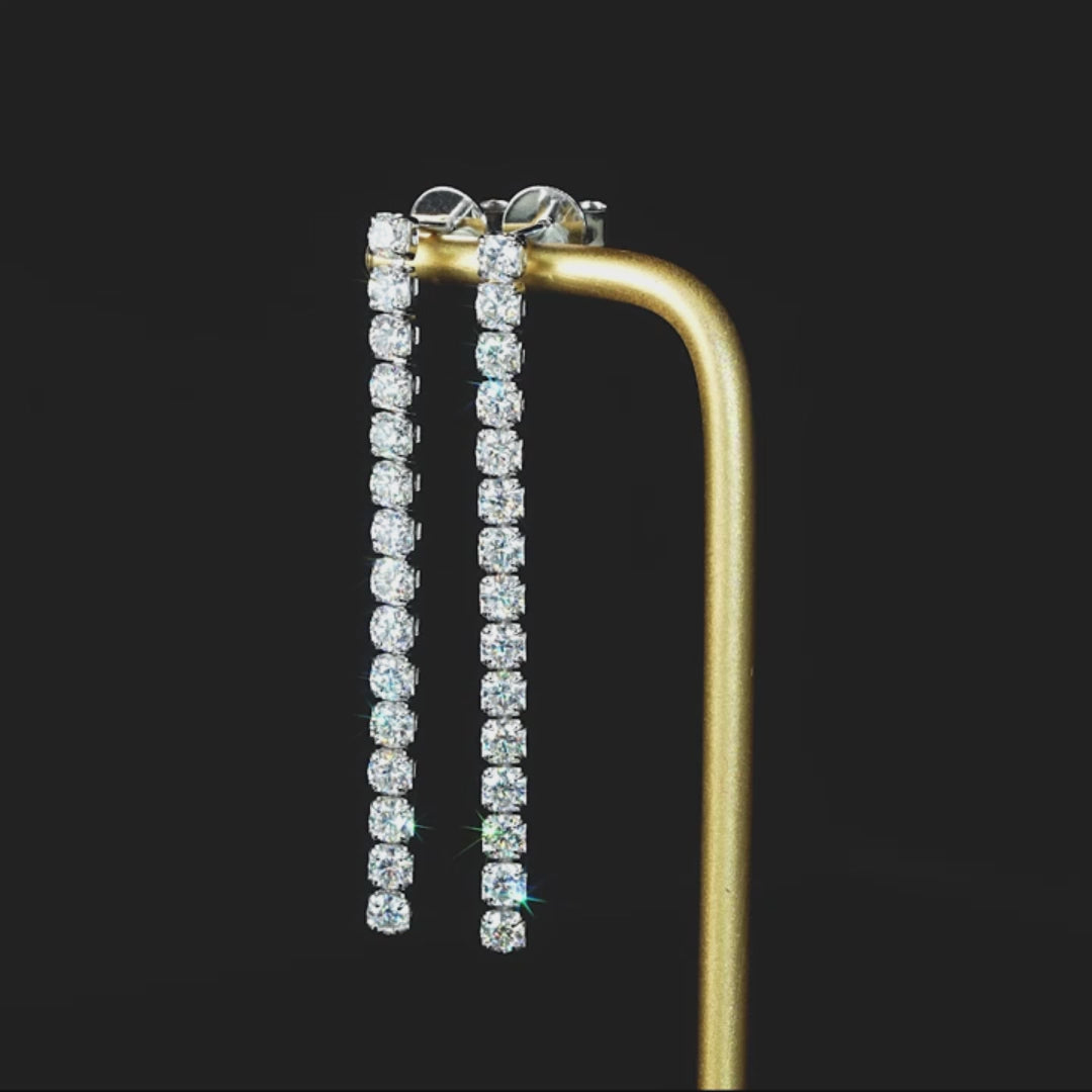 Video showing moissanite drop dangle earrings sparkling from all angles, 30 D color VVS1 stones in gold and silver, brilliance and movement - Sensitive Stones