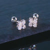 Close-up of Four Leaf Clover Moissanite Stud Earrings set in 925 sterling silver and plated with 18K white gold