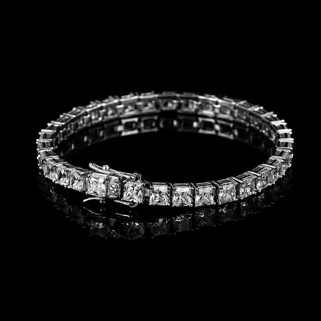 Princess cut moissanite tennis bracelet on a black reflective surface, showing square D Color VVS1 stones in four-prong settings - Sensitive Stones