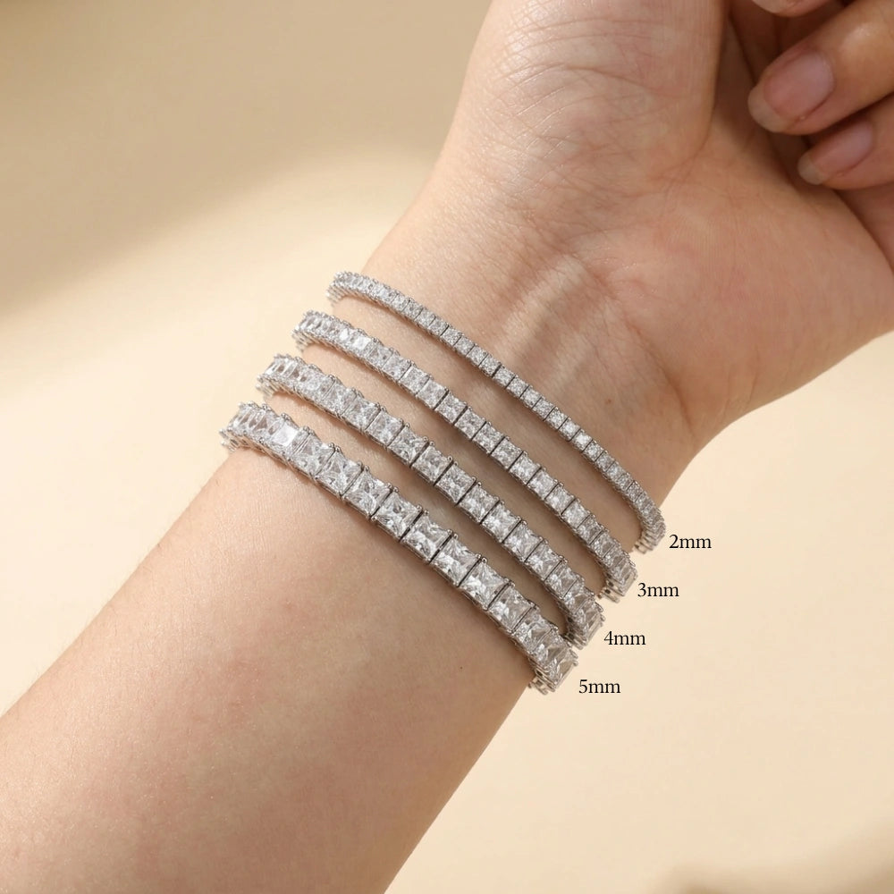 Size comparison of 2mm, 3mm, 4mm and 5mm princess cut moissanite tennis bracelets stacked on a wrist - Sensitive Stones