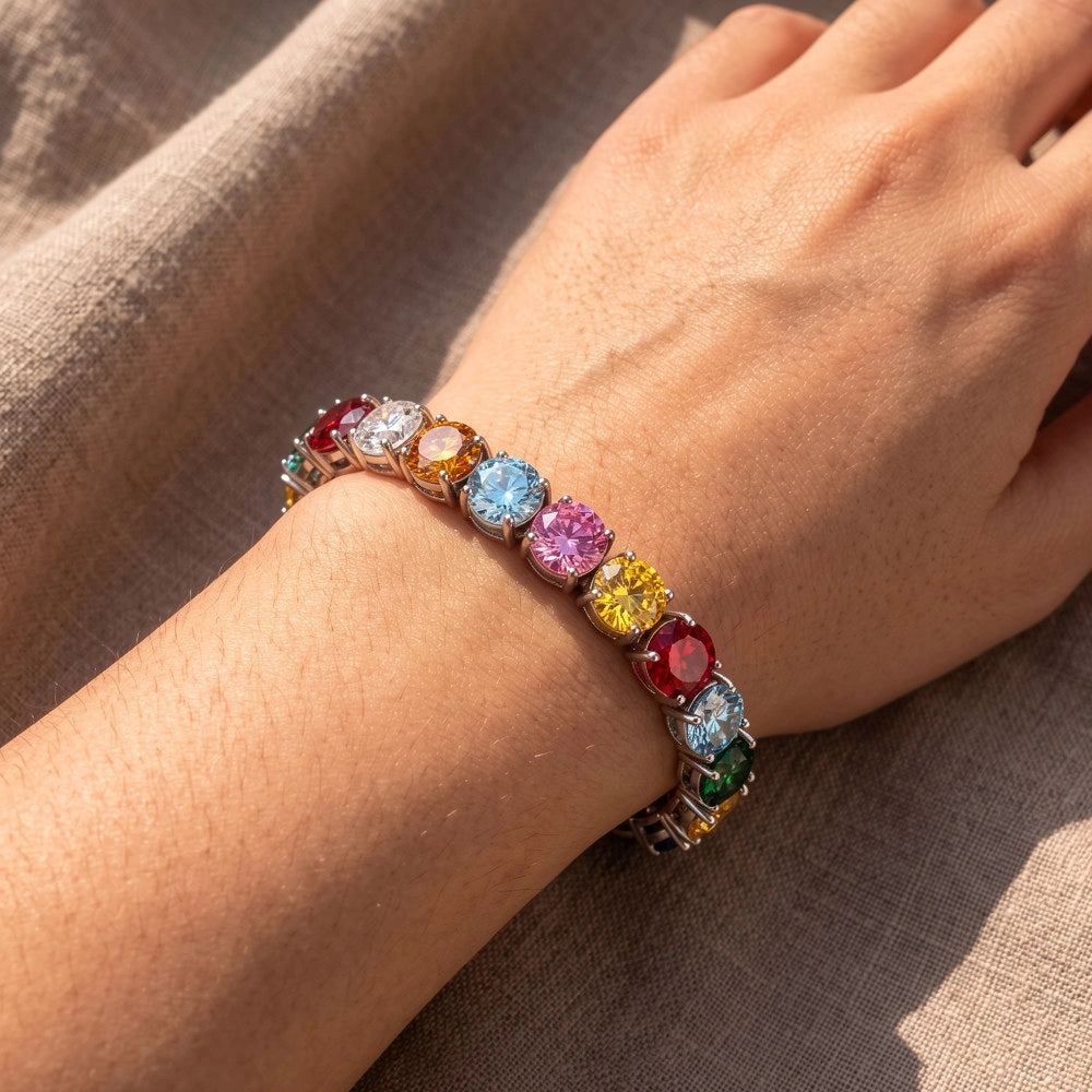Rainbow moissanite tennis bracelet worn on the wrist - Sensitive Stones
