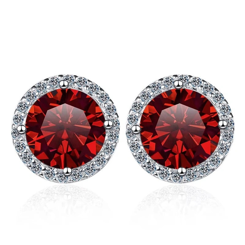 Ruby red moissanite halo stud earrings in 925 sterling silver on white background - Sensitive Stones