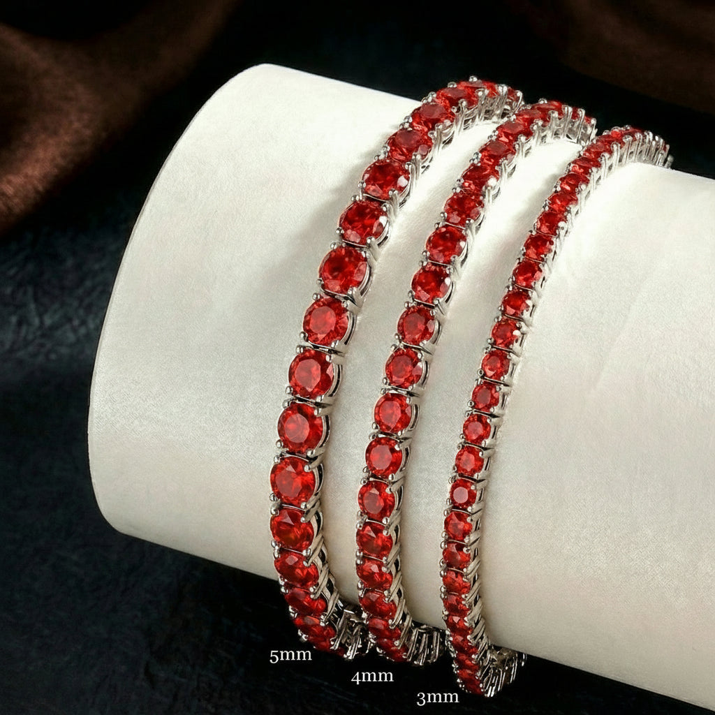 Red moissanite tennis bracelet size comparison showing 3mm, 4mm, and 5mm stone widths in sterling silver with white gold plating on display stand - Sensitive Stones