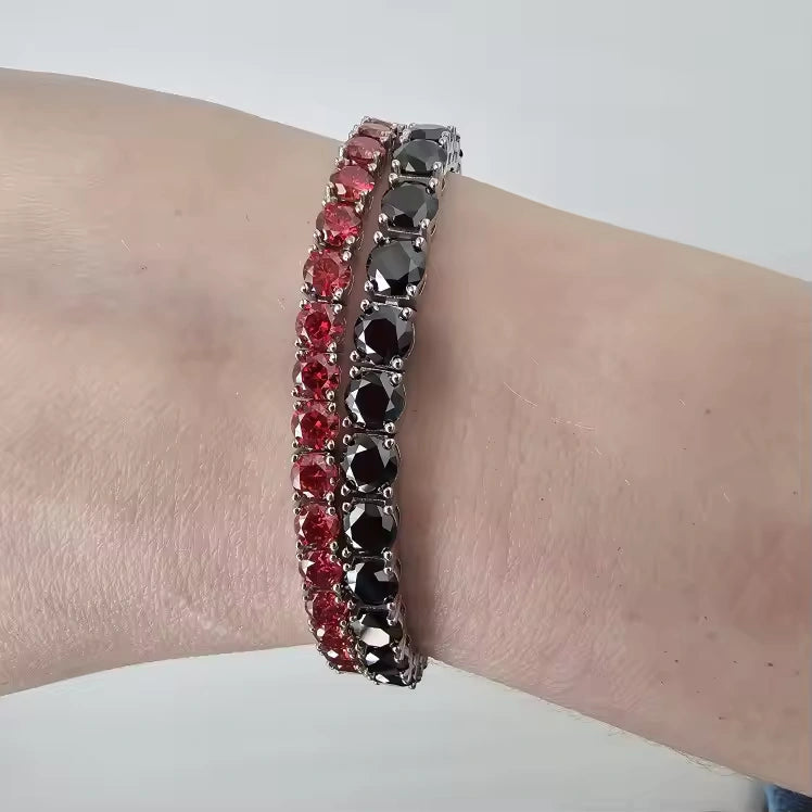 4mm red moissanite tennis bracelet in sterling silver with white gold plating, shown stacked with 5mm black moissanite bracelet on wrist - Sensitive Stones