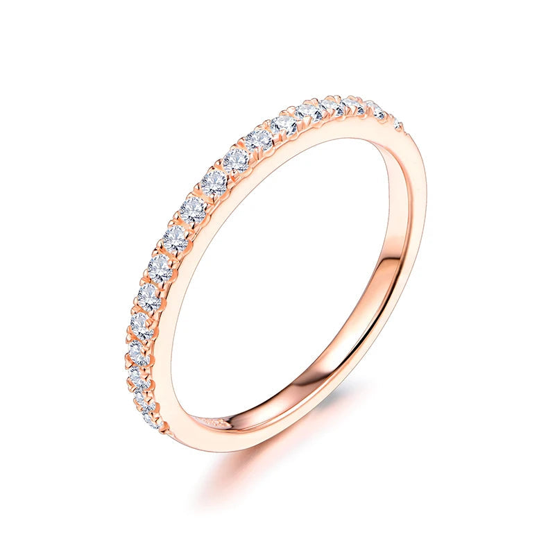18K rose gold plated moissanite ring set in solid 925 sterling silver in a half eternity band design on a white background - Sensitive Stones