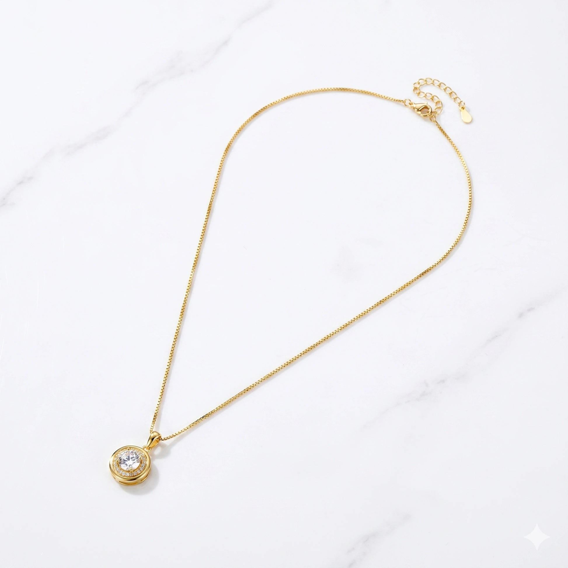 Round moissanite halo pendant necklace on a white surface - Sensitive Stones