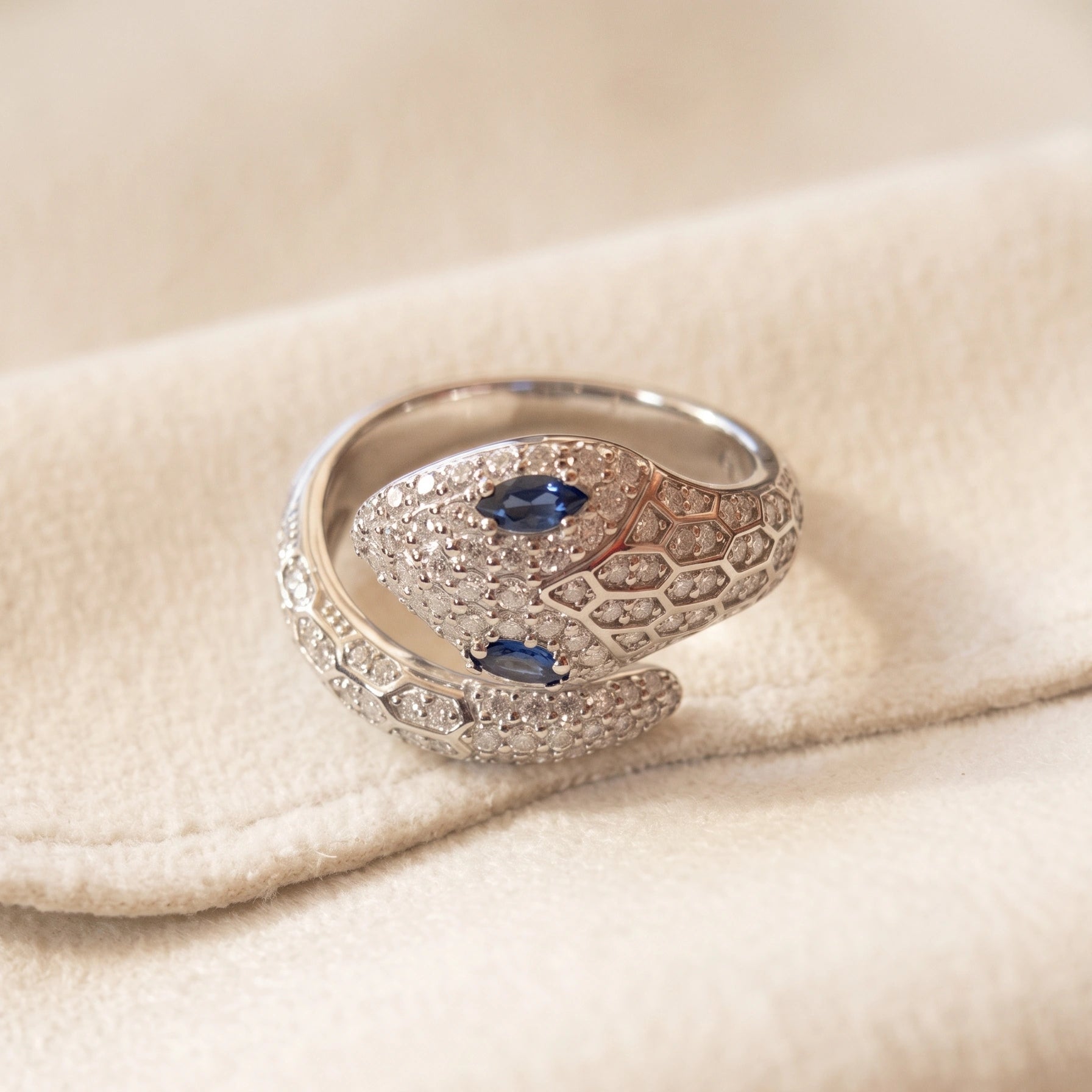 Sapphire-eyed moissanite snake ring in 925 sterling silver with 18K gold plating and lab-created blue marquise eyes - Sensitive Stones