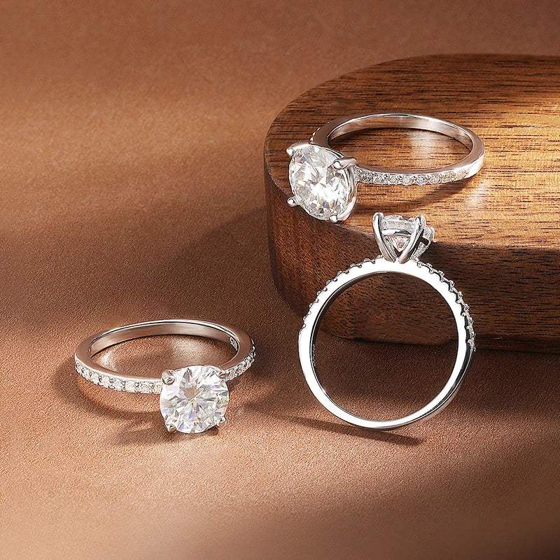 Side profile of D-Color Moissanite Engagement Ring – solitaire with prong setting, pavé CZ band, 8 Hearts & 8 Arrows cut – Sensitive Stones