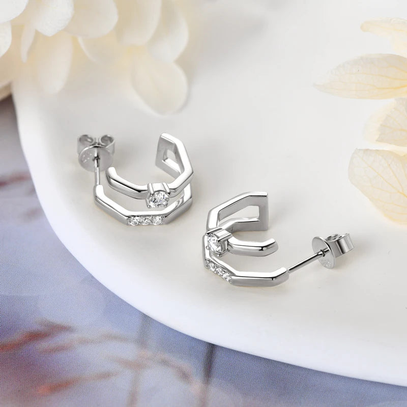 Side view of pair of sterling silver moissanite double band cuff earrings in white gold plating  - Sensitive Stones