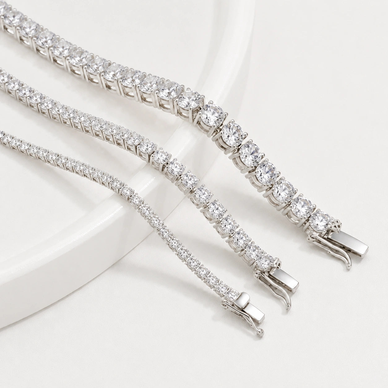 White moissanite tennis necklace stone width comparison, three strands in white gold plated 925 sterling silver, 4-prong round stones, box clasps - Sensitive Stones